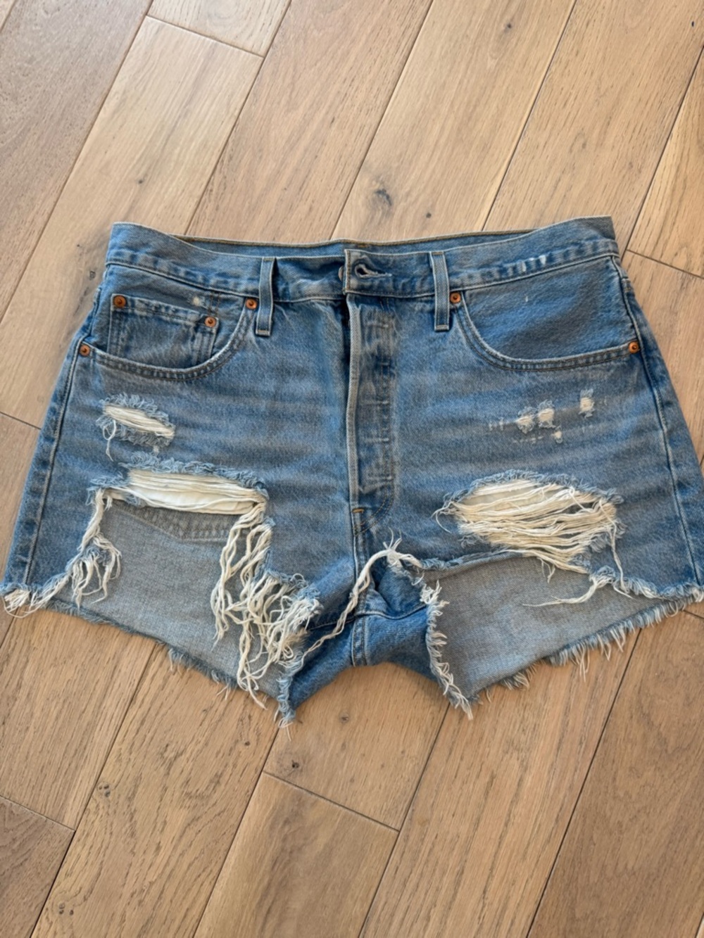 Levi's Distressed Light Blue Denim Cutoff Shorts